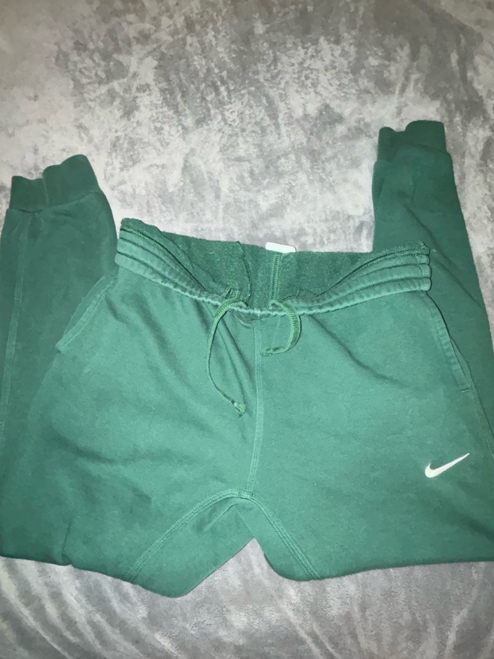 Nike men’s Green Fleece Joggers with White Swoosh